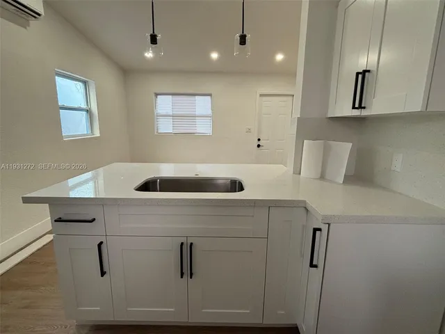 an empty room with a workbench