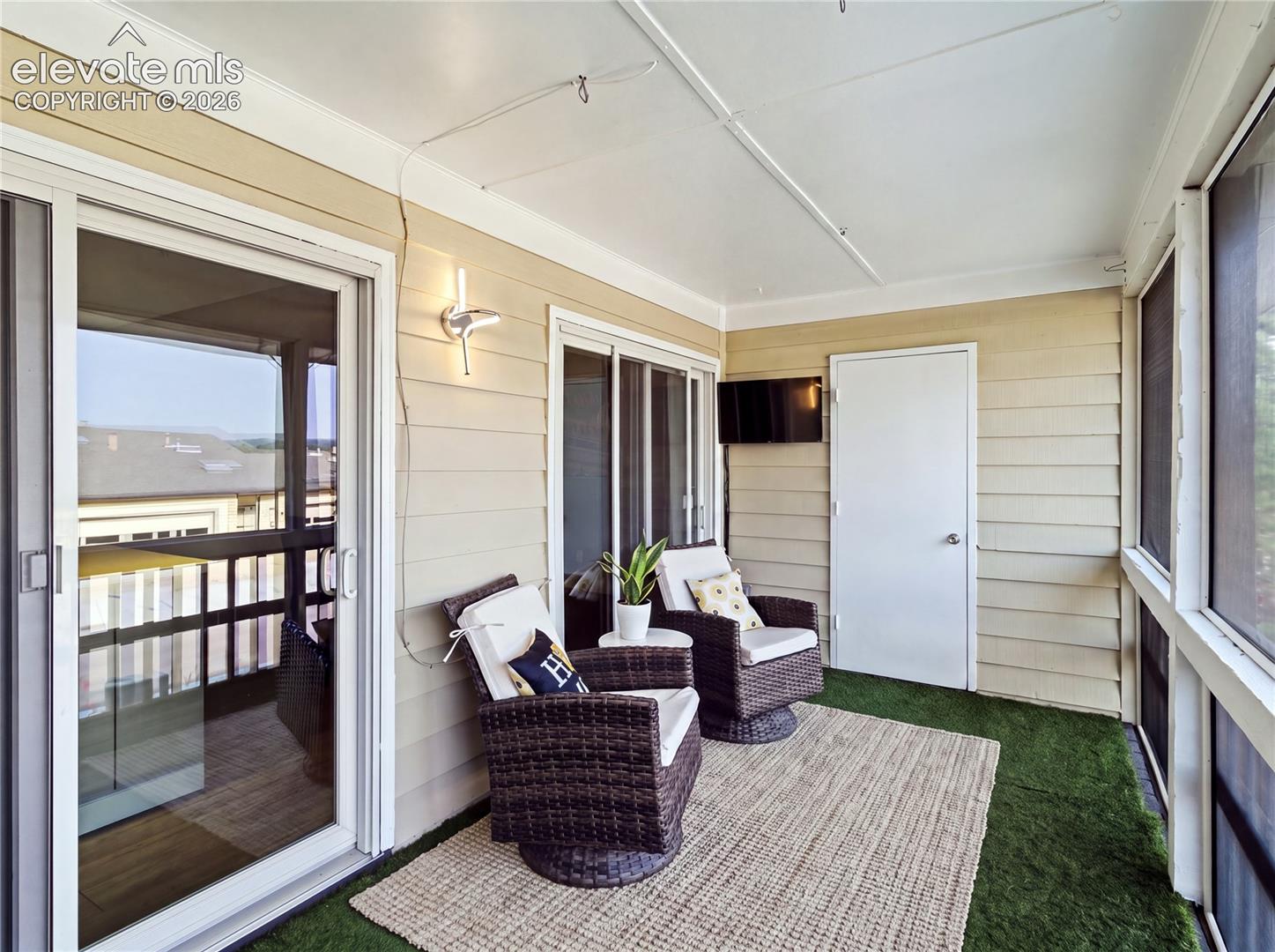 329 Raspberry Lane Monument, CO 80132 - Photo 5 of 25 A private screened-in deck creates the perfect spot to relax, unwind, and enjoy the fresh Colorado air.