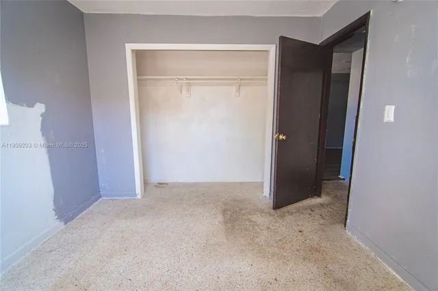 an empty room with closet
