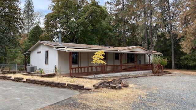 1740 Summit Loop Grants Pass, OR 97527 - Photo 31 of 39 LEFT SIDE HOUSE