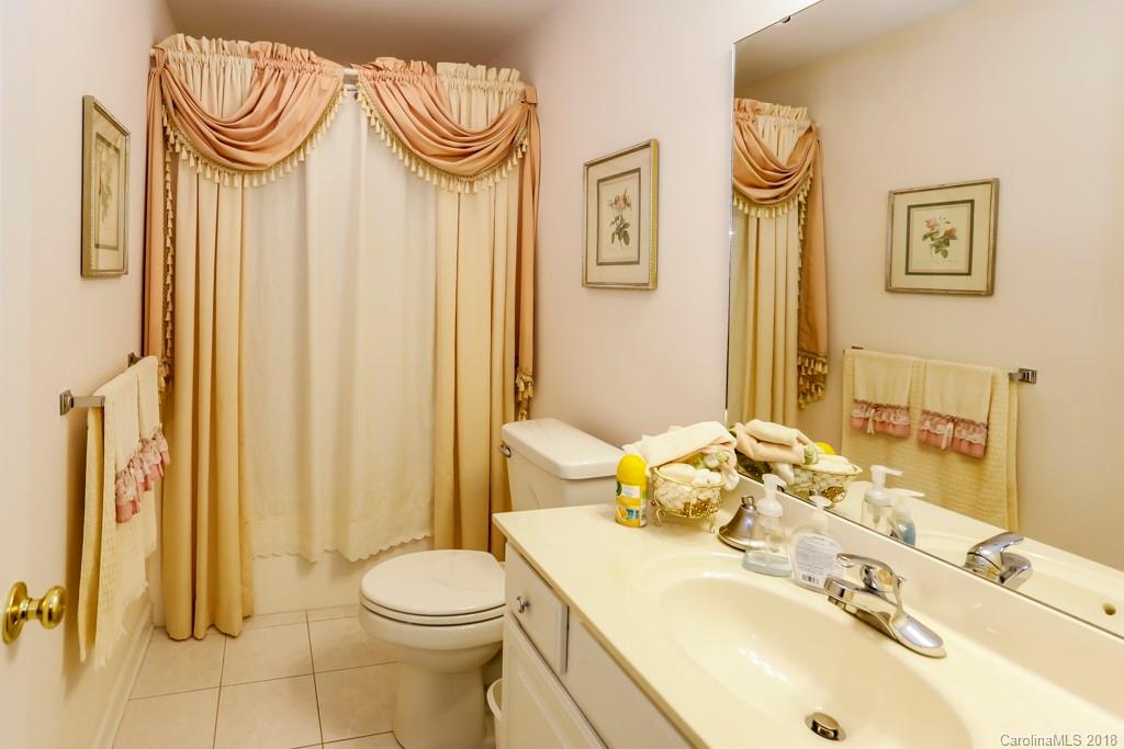 321 Ridgeview Drive Rutherfordton, NC 28139 - Photo 18 of 25 a bathroom with a sink a toilet and a mirror