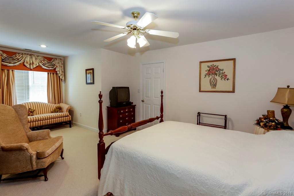321 Ridgeview Drive Rutherfordton, NC 28139 - Photo 19 of 25 a bedroom with a bed and ceiling fan