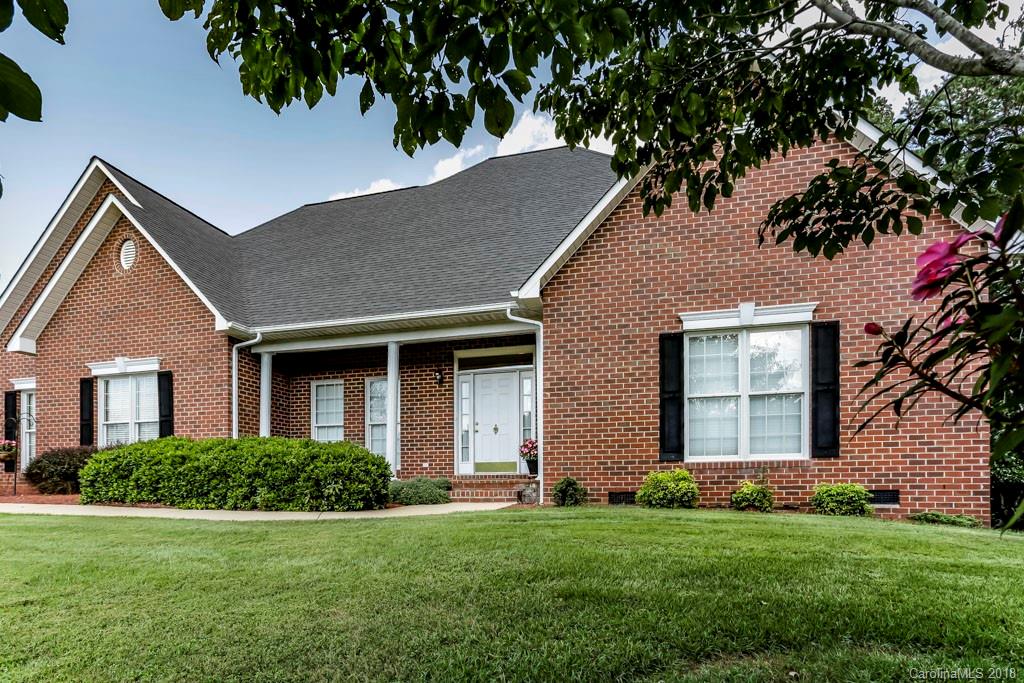 321 Ridgeview Drive Rutherfordton, NC 28139 - Photo 23 of 25 a front view of a house with a yard and garage