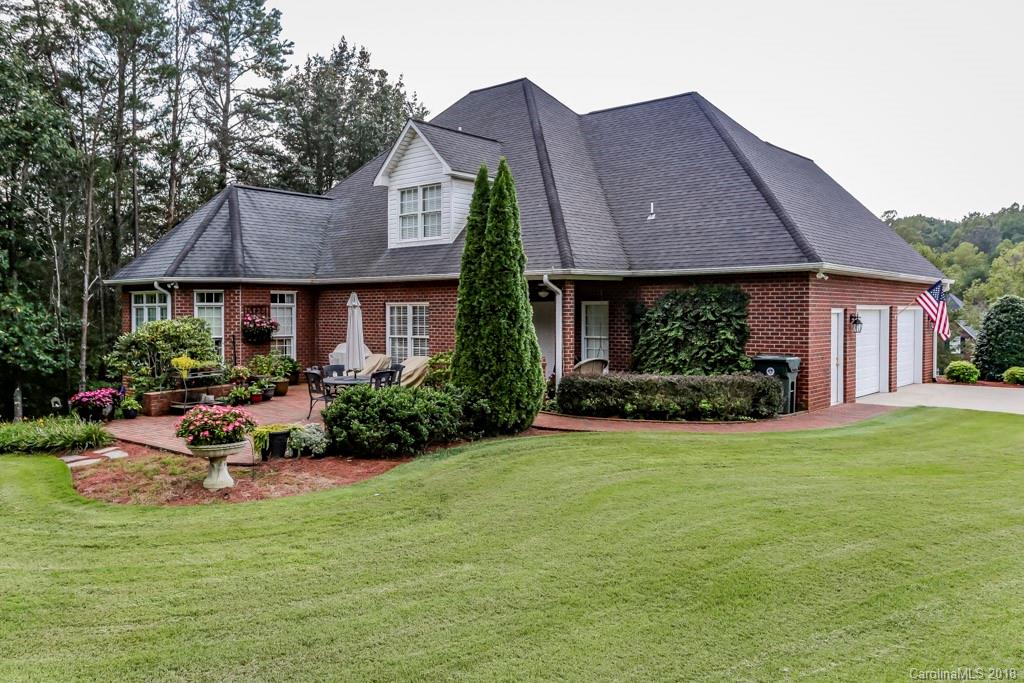 321 Ridgeview Drive Rutherfordton, NC 28139 - Photo 25 of 25 a view of a house with a garden