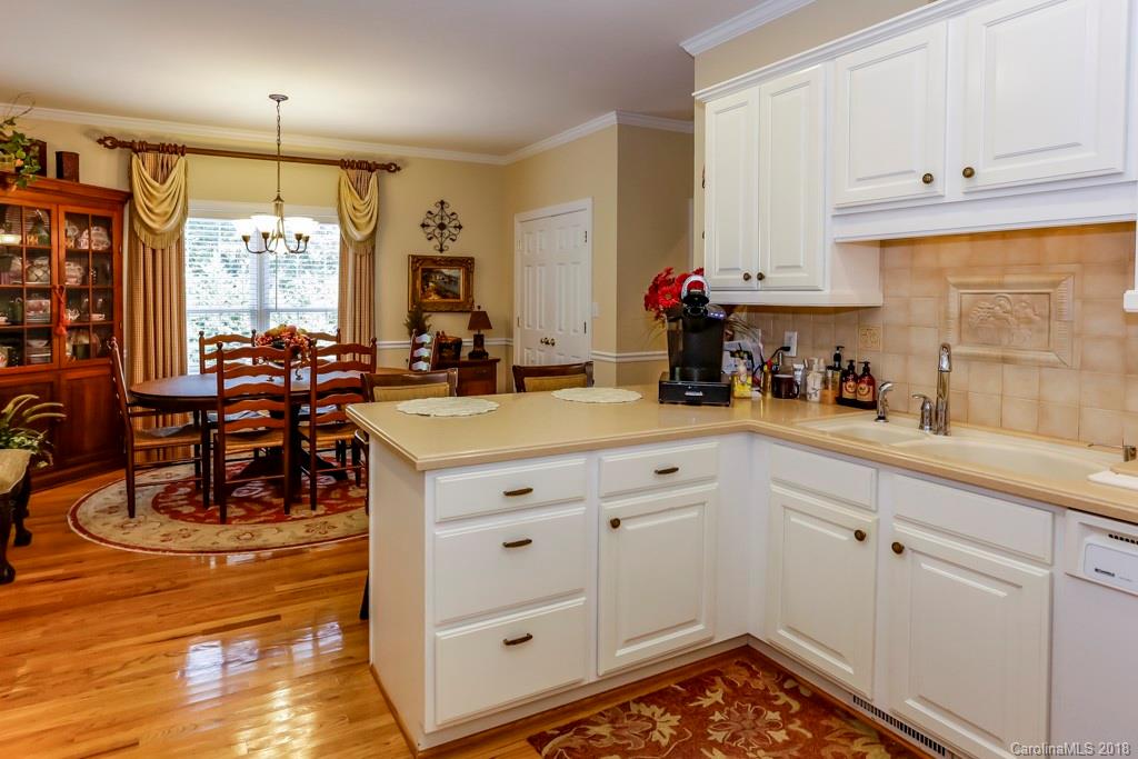 321 Ridgeview Drive Rutherfordton, NC 28139 - Photo 10 of 25 a kitchen with white cabinets and window
