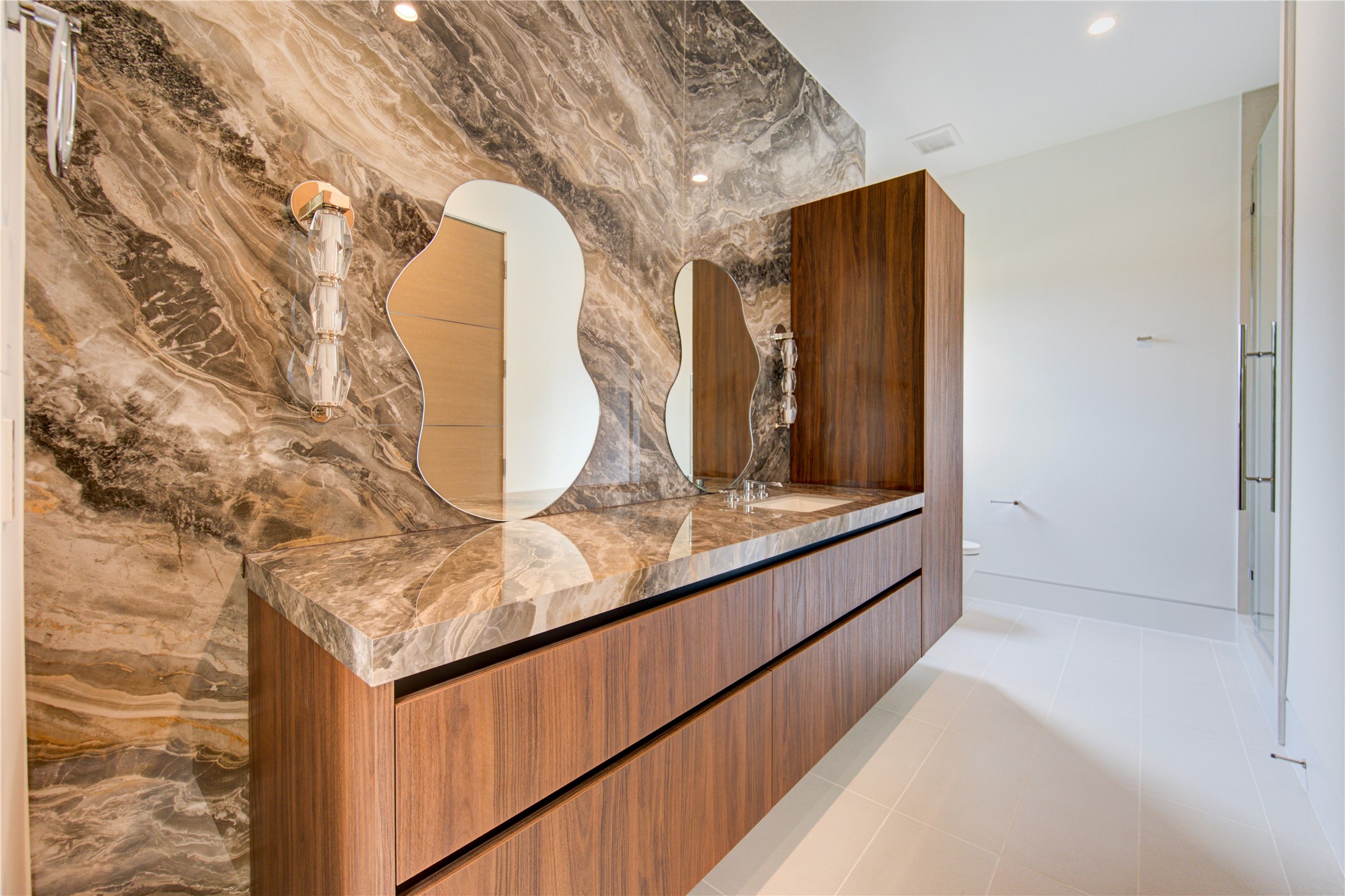 2006 Suffolk Drive Houston, TX 77027 - Photo 22 of 29 a bathroom with a granite countertop sink and a mirror
