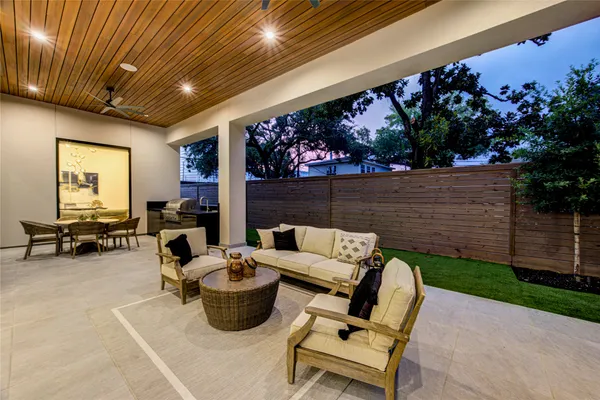 a outdoor living space with furniture and garden view
