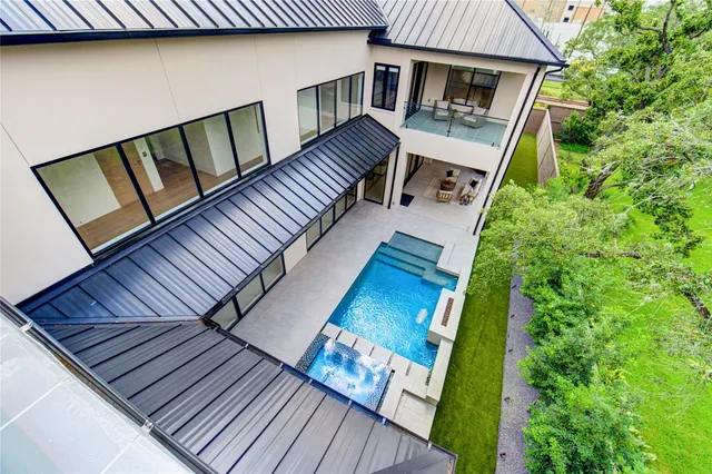a view of balcony with wooden floor and fence