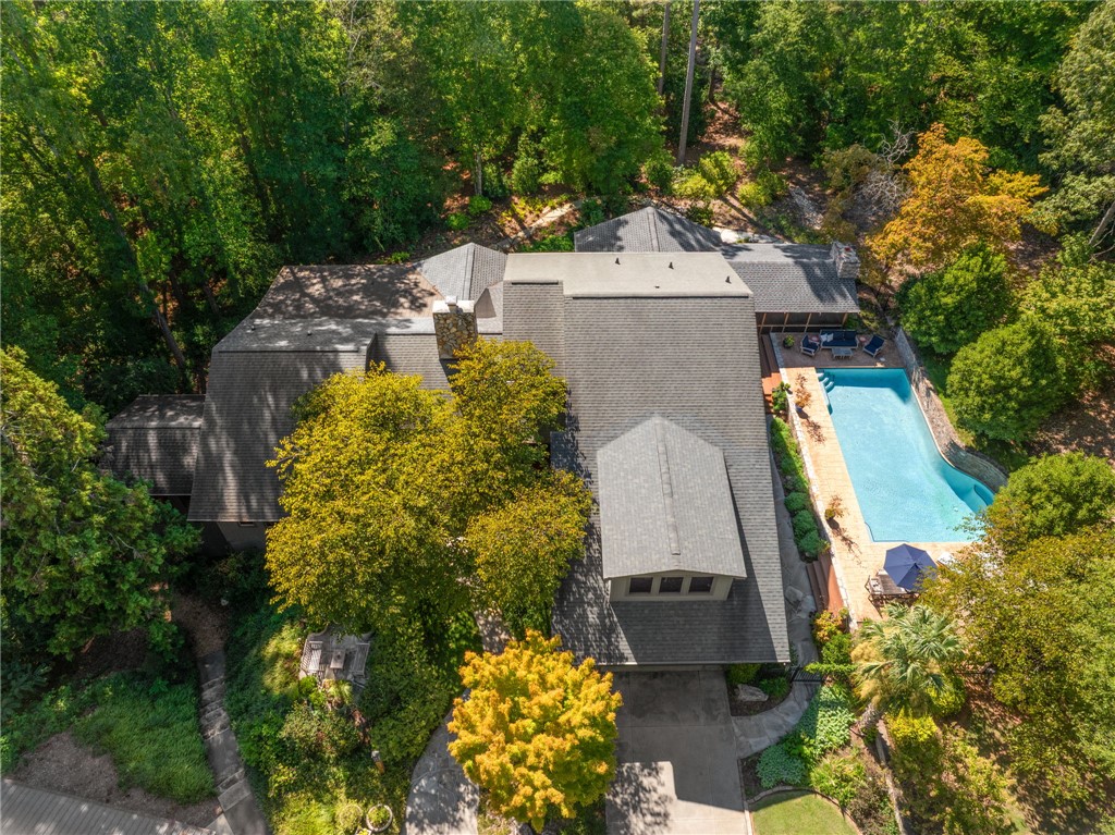 604 Ridgecrest Drive Clemson, SC 29631 - Photo 4 of 50 Lush mature trees surround a custom residence featuring a private pool and stone chimney.
