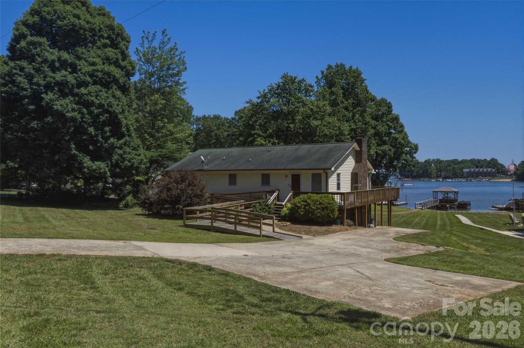 8226 Normandy Road Denver, NC 28037 - Photo 1 of 29 a view of a house with a yard