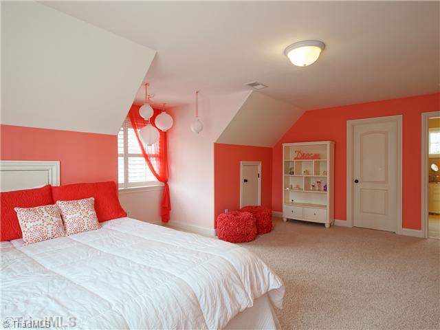 8500 Crested Oak Court Oak Ridge, NC 27310 - Photo 11 of 16 2nd Bedroom. Upstairs, there are two huge bedrooms, each with a private vanity and a shared tub/toilet area, walk-in closets, and fun, interesting angles and windows; a third room upstairs with a walk-in storage area makes the perfect office, study or craft room.