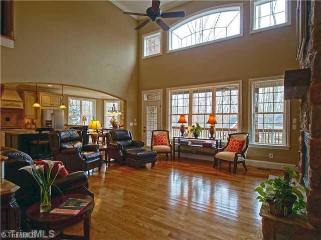 8500 Crested Oak Court Oak Ridge, NC 27310 - Photo 5 of 16 Den/Family/Great Room. The big, open archway between the great room and kitchen gives an illusion of separation while providing an open flow making the spaces truly connected.