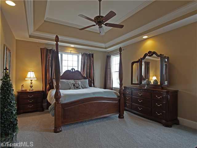 8500 Crested Oak Court Oak Ridge, NC 27310 - Photo 9 of 16 Master Bedroom. A retreat within your own home, the master suite is private and away from the public areas. The bedroom is spacious with room for a sitting area. There are also two walk-in closets.