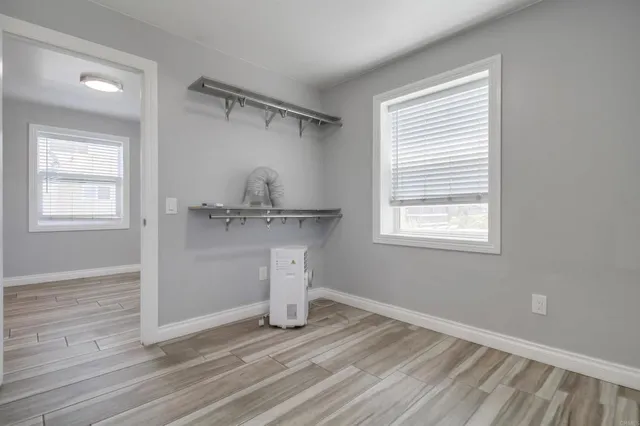 a view of an empty walk in closet