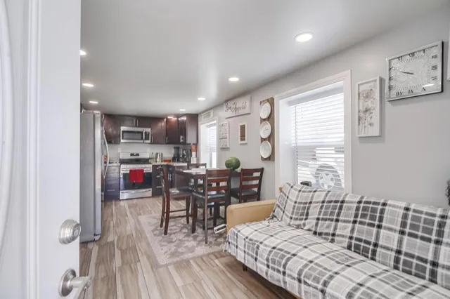 a view of kitchen and dining area with furniture