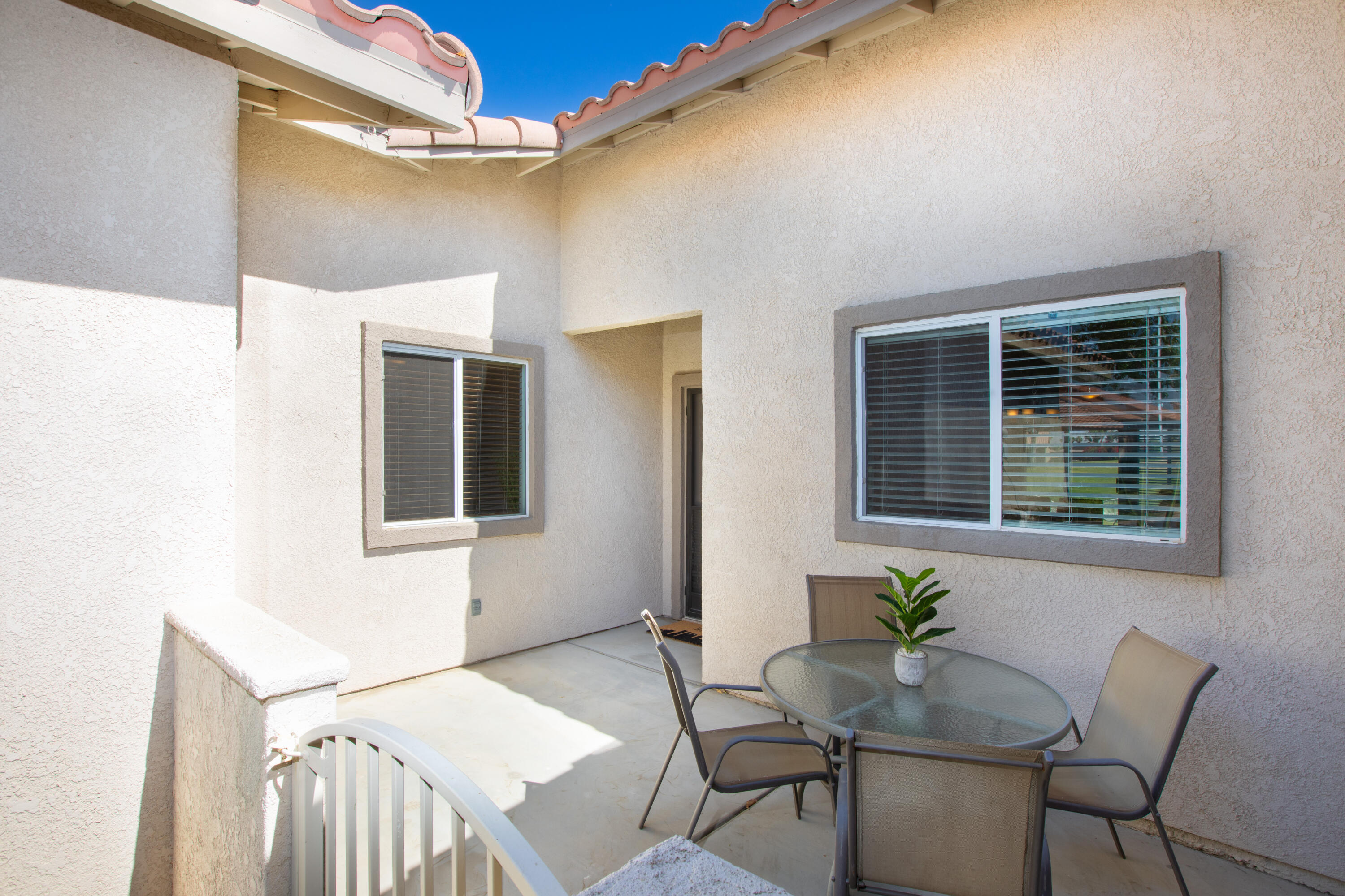 82368 Lancaster Way Indio, CA 92201 - Photo 19 of 35 a view of a livingroom with furniture and window