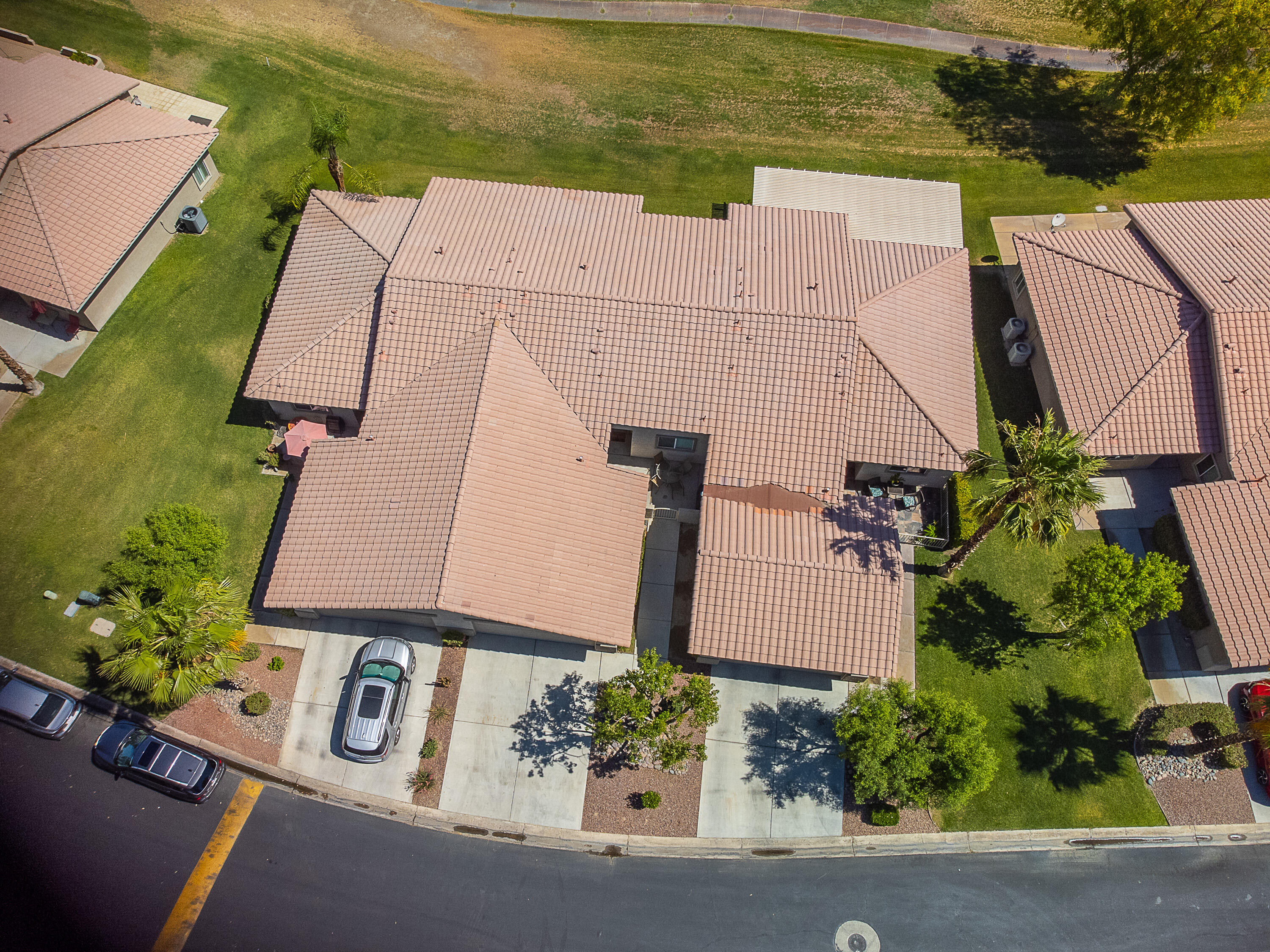82368 Lancaster Way Indio, CA 92201 - Photo 33 of 35 an aerial view of a house with outdoor space and lake view