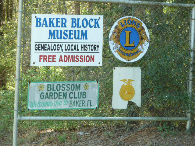 Xx Melton Road Baker, FL 32531 - Photo 3 of 8 a sign that is on a brick wall