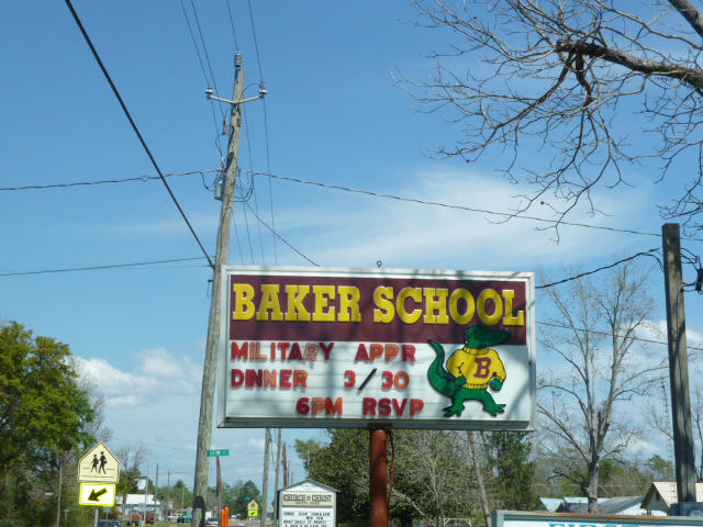 Xx Melton Road Baker, FL 32531 - Photo 4 of 8 a sign on the wall