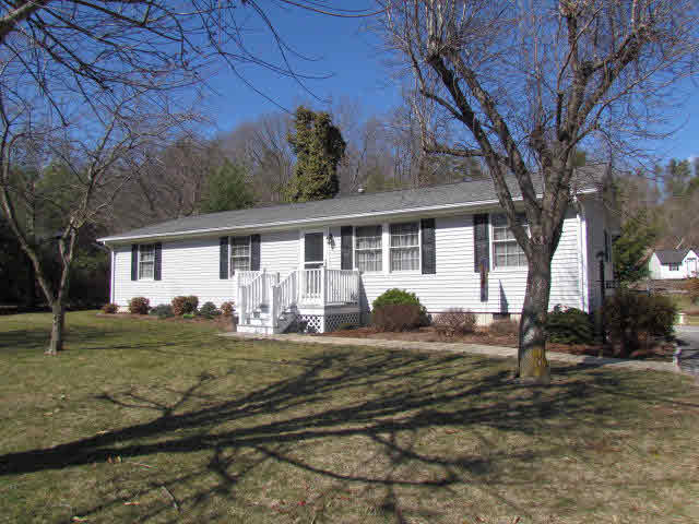 7670 Briery Branch Road Dayton, VA 22821 - Photo 1 of 14 a front view of a house with a yard