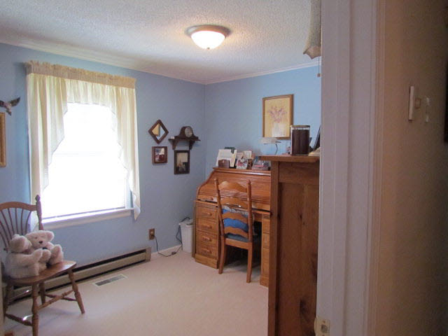 7670 Briery Branch Road Dayton, VA 22821 - Photo 10 of 14 a bedroom with bed and a window