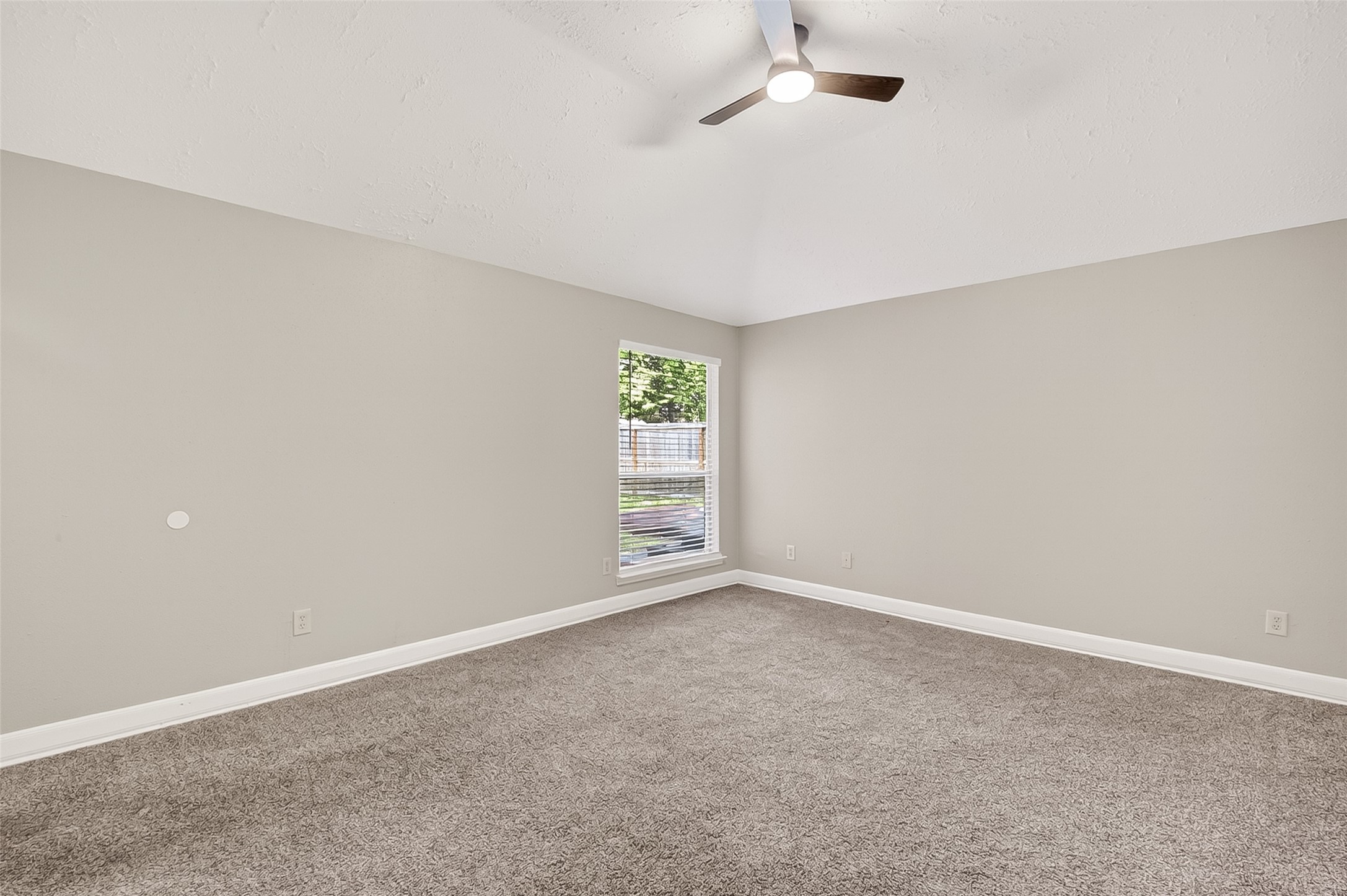 12403 Meadow Ridge Drive Stafford, TX 77477 - Photo 25 of 47 an empty room with windows