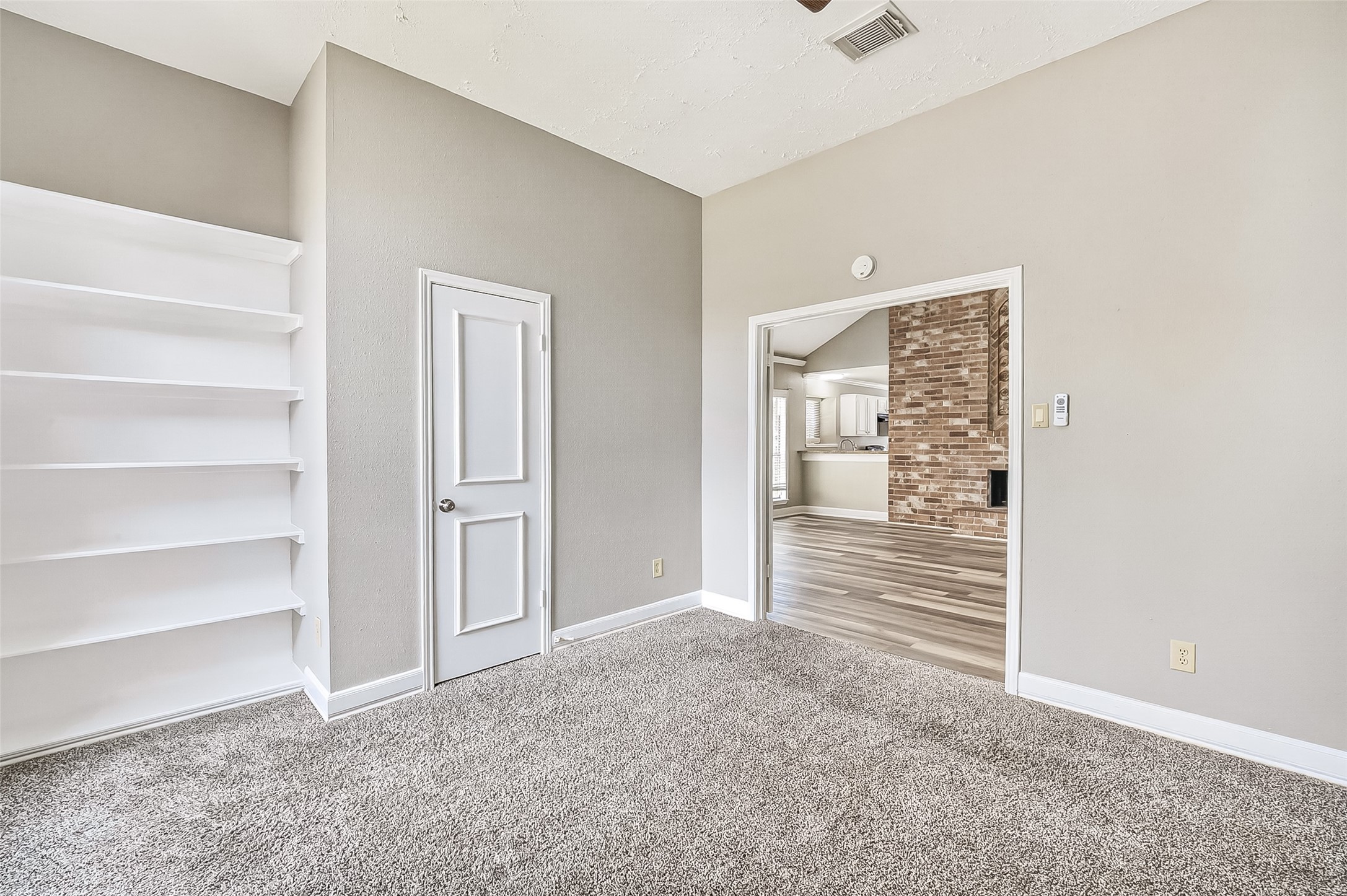 12403 Meadow Ridge Drive Stafford, TX 77477 - Photo 36 of 47 a view of room with door and white walls