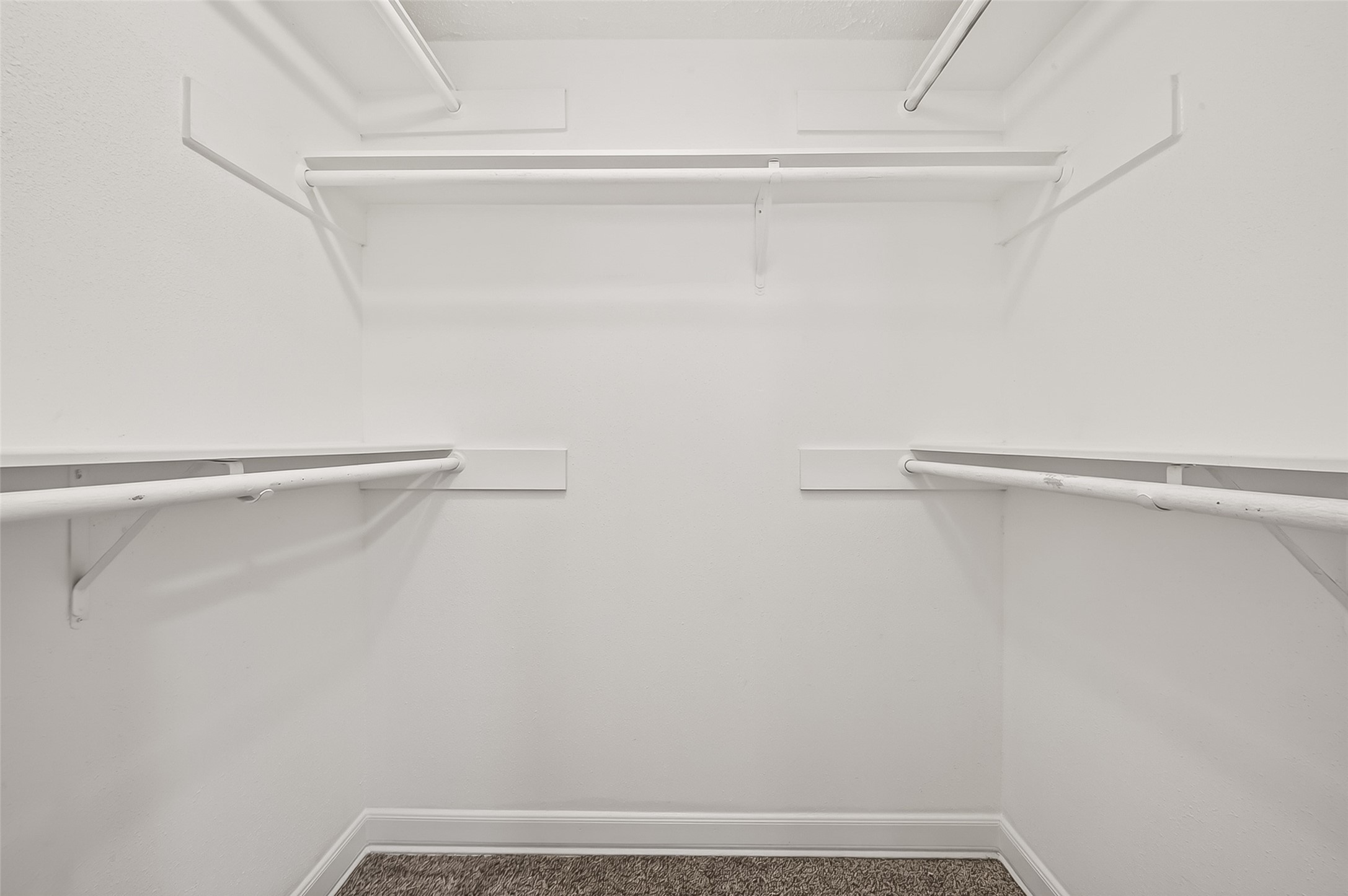 12403 Meadow Ridge Drive Stafford, TX 77477 - Photo 39 of 47 a view of small space with racks on the wall
