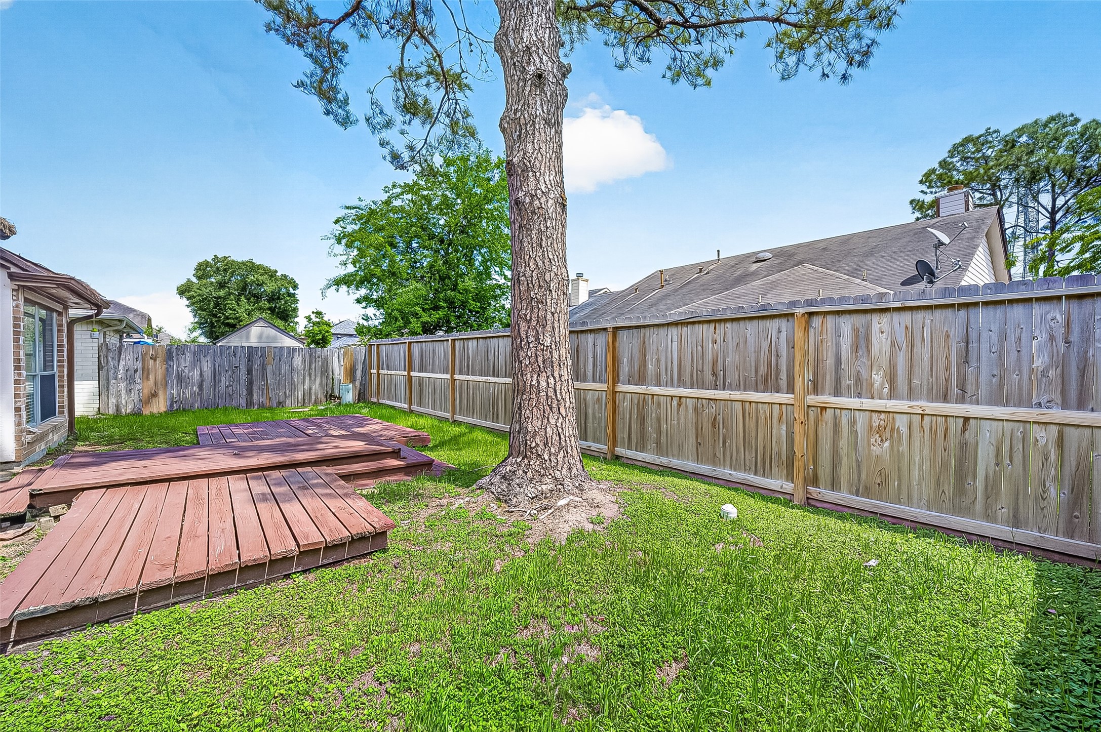 12403 Meadow Ridge Drive Stafford, TX 77477 - Photo 42 of 47 a view of a backyard with a garden