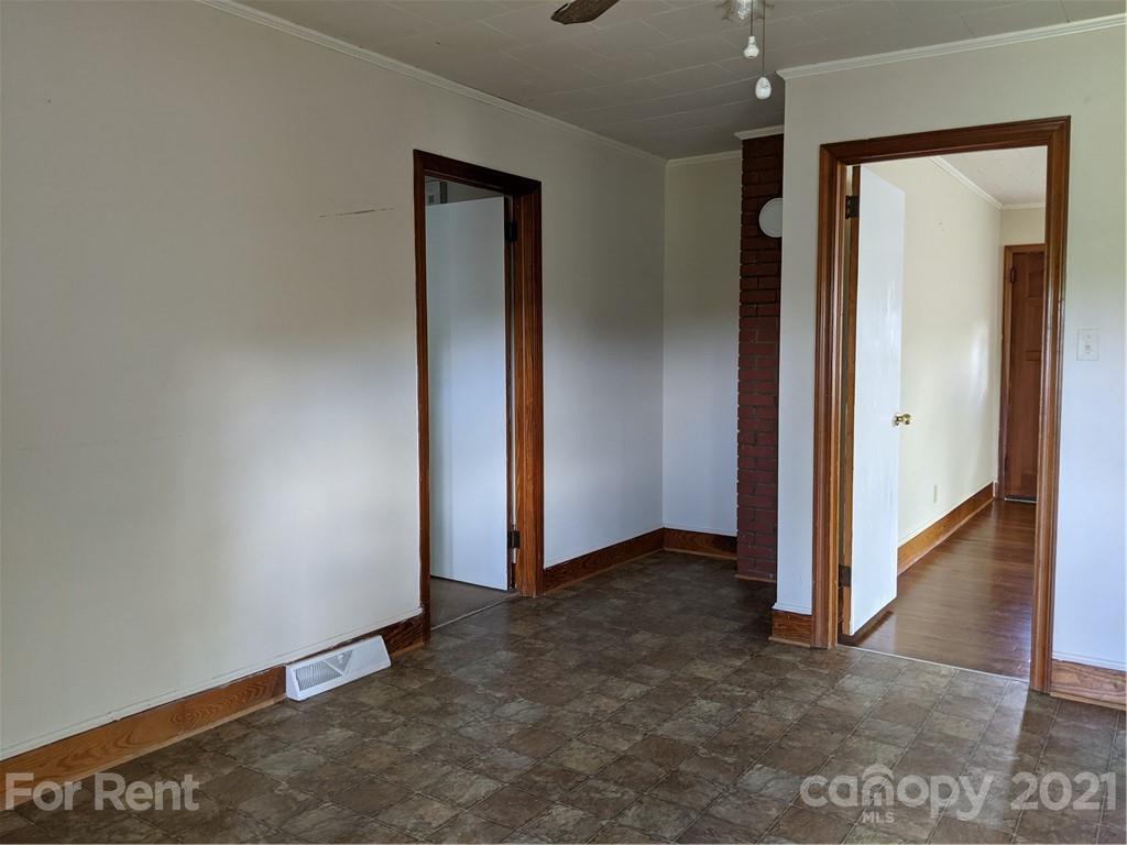 401 Gribble Road Matthews, NC 28104 - Photo 7 of 13 an empty room with windows and closet