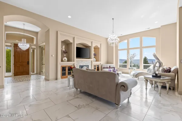 a bedroom with bed and a flat tv screen