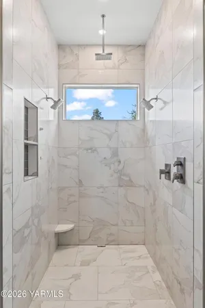 a view of a living room and kitchen