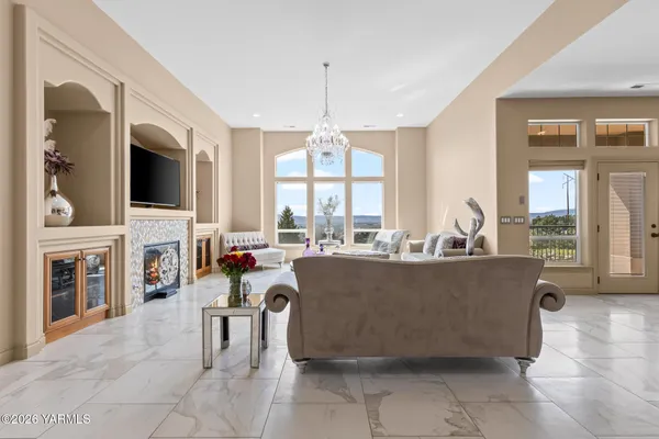 a kitchen with granite countertop a stove top oven