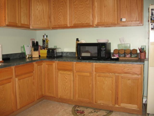212 Carter Blake Road Tullahoma, TN 37388 - Photo 5 of 20 Kitchen features an abundance of oak cabinetry, all appliances including refrigerator, stove and dishwasher.
