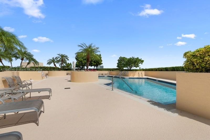 2475 Brickell Avenue, Unit 1606 Miami, FL 33129 - Photo 16 of 21 a view of swimming pool with a yard