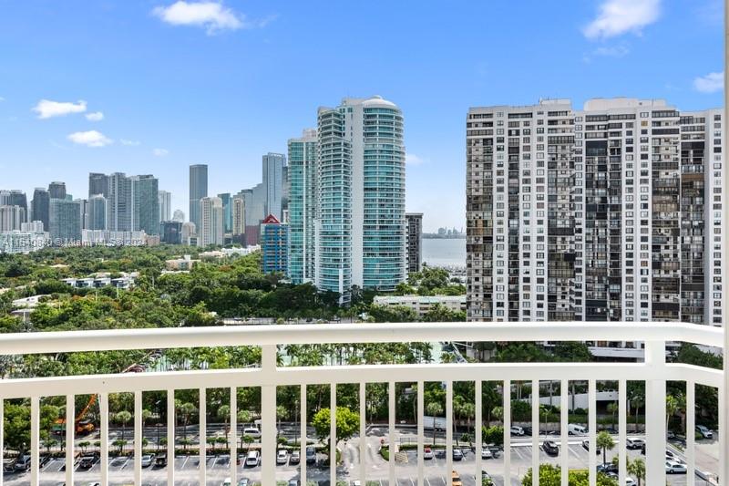 2475 Brickell Avenue, Unit 1606 Miami, FL 33129 - Photo 10 of 21 a view of a building with a garden