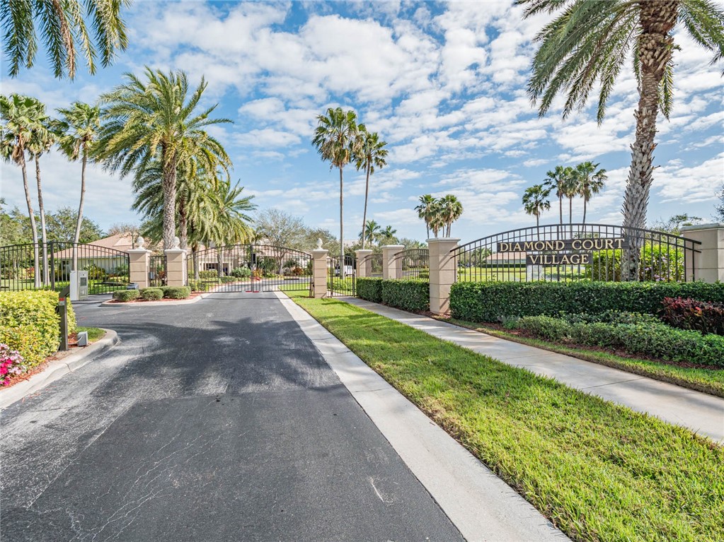 4229 Diamond Square Vero Beach, FL 32967 - Photo 1 of 36 a view of a street with palm trees