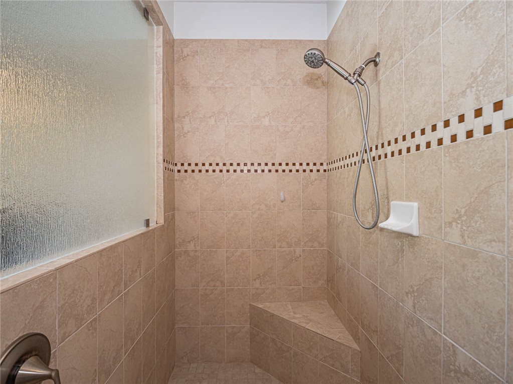 4229 Diamond Square Vero Beach, FL 32967 - Photo 26 of 36 a bathroom with a shower