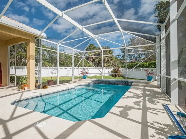 a view of a backyard of a house