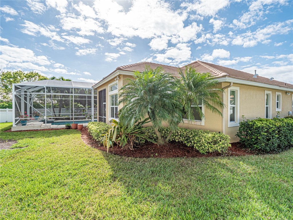 4229 Diamond Square Vero Beach, FL 32967 - Photo 36 of 36 a view of a house with a garden