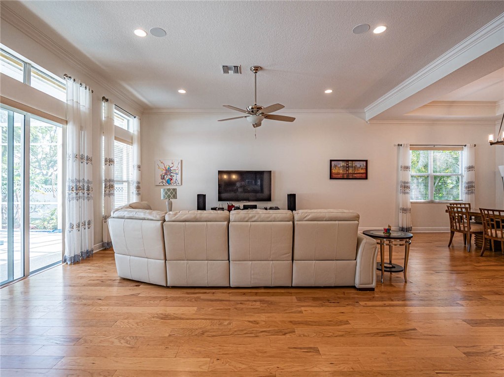 4229 Diamond Square Vero Beach, FL 32967 - Photo 6 of 36 a living room with furniture and a large window