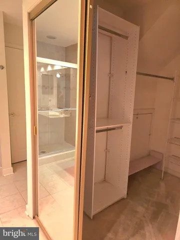 a view of an empty room with stairs