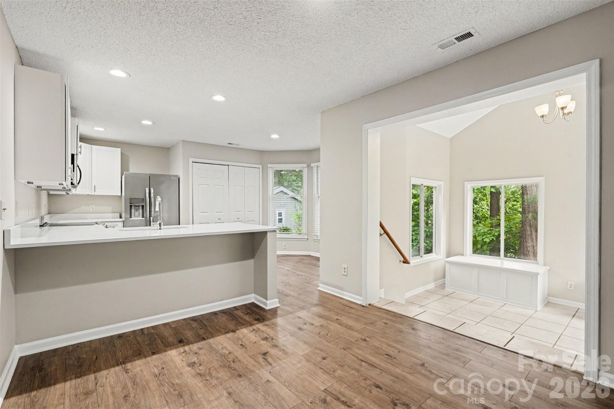 9060 Tulagi Court Tega Cay, SC 29708 - Photo 9 of 29 a view of kitchen with sink and refrigerator
