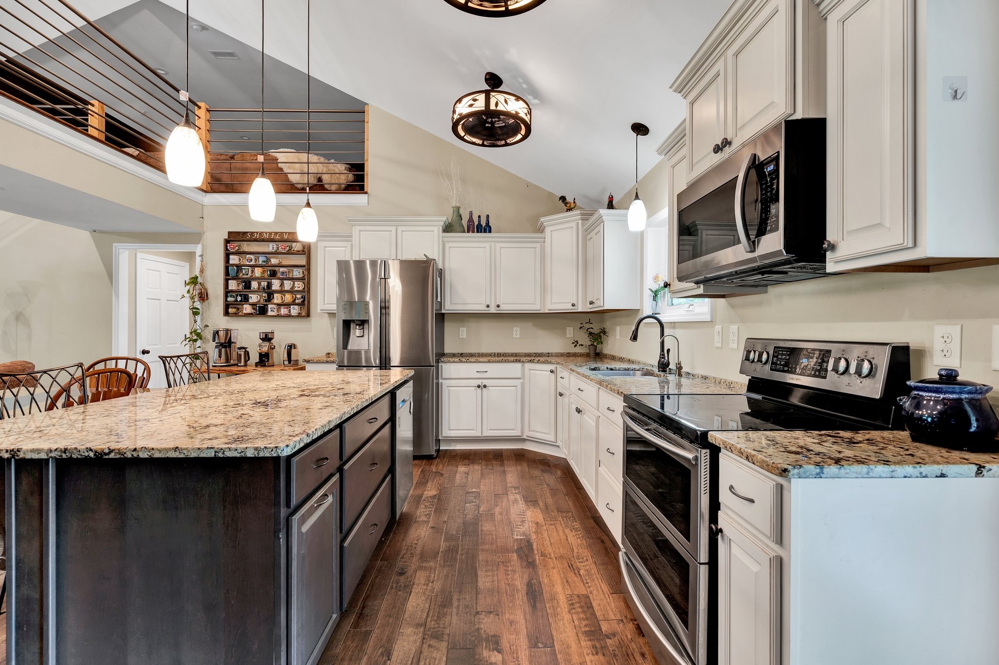 1600 Union Road Southeast Cleveland, TN 37323 - Photo 11 of 68 a kitchen with stainless steel appliances granite countertop a sink stove and refrigerator