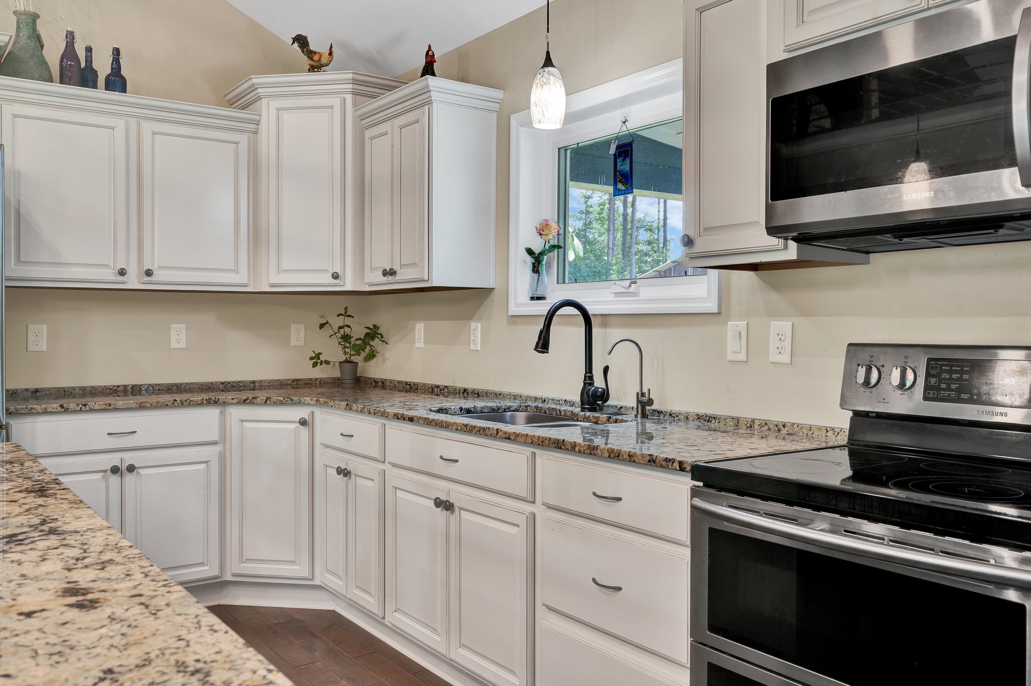 1600 Union Road Southeast Cleveland, TN 37323 - Photo 14 of 68 a kitchen with stainless steel appliances granite countertop a sink and a stove