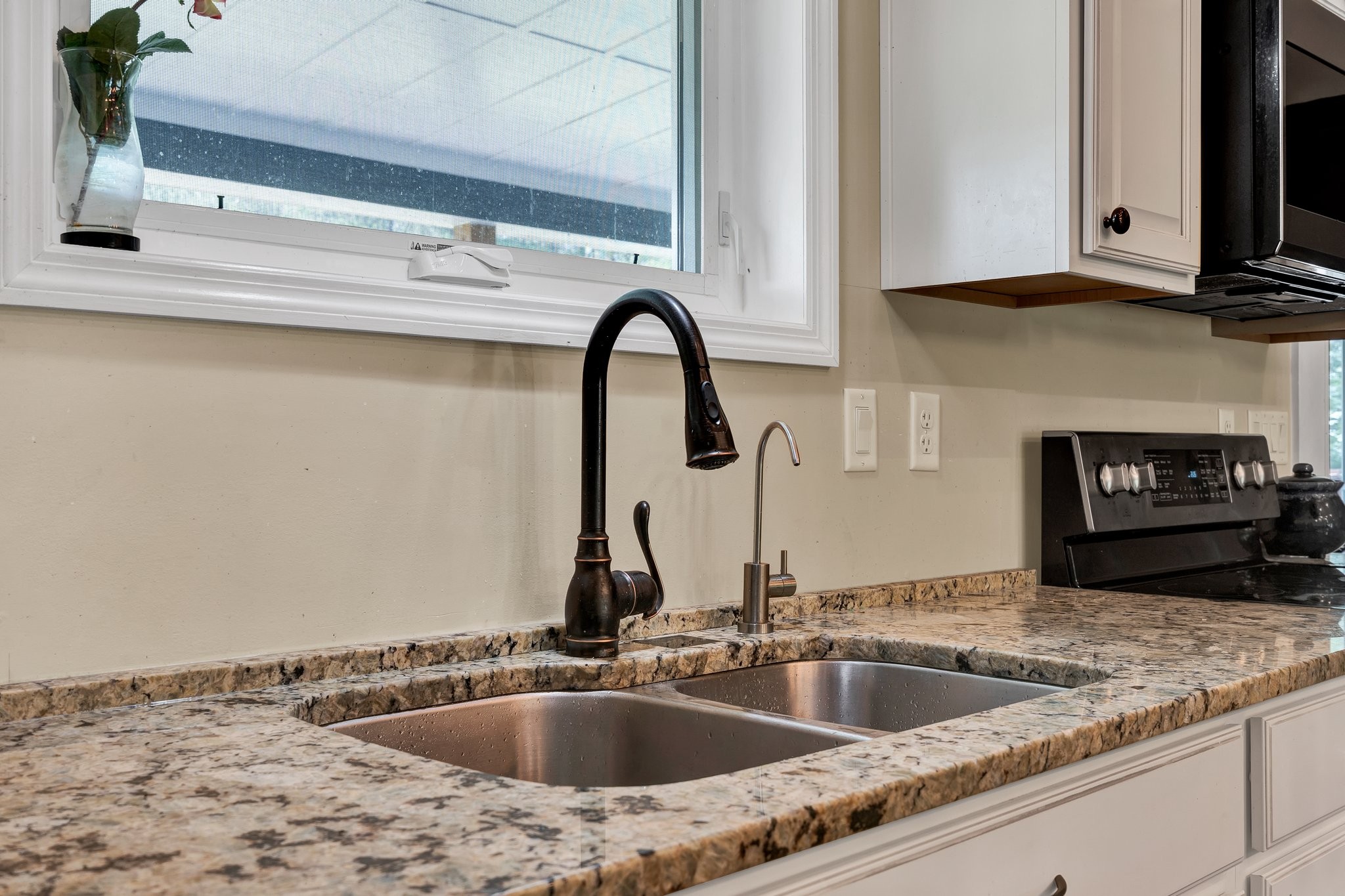 1600 Union Road Southeast Cleveland, TN 37323 - Photo 16 of 68 a close view of a sink and a microwave in a kitchen