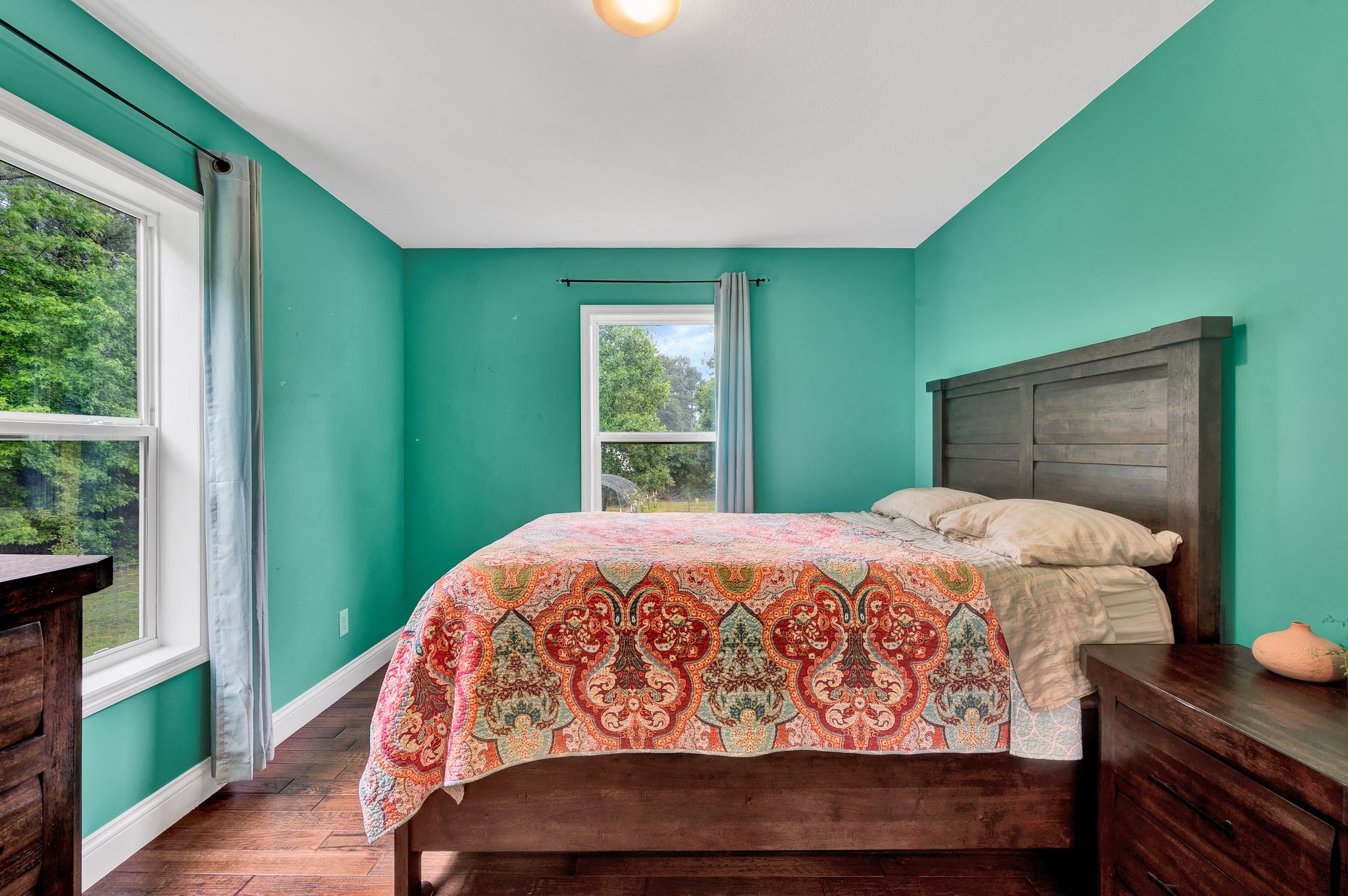 1600 Union Road Southeast Cleveland, TN 37323 - Photo 18 of 68 a bed sitting in a bedroom next to a window