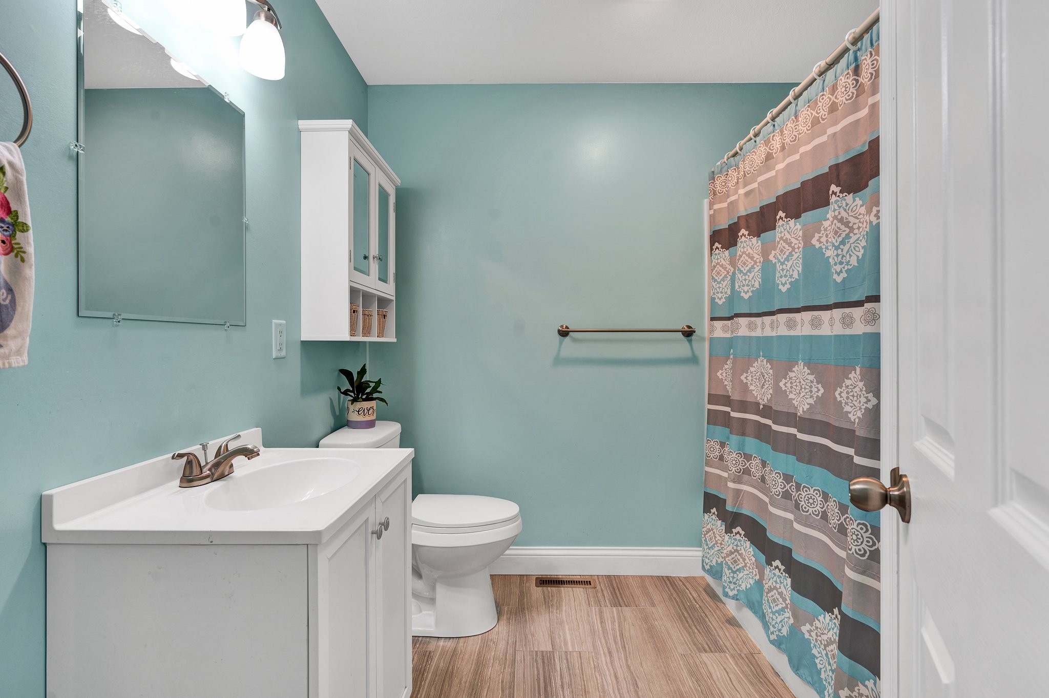 1600 Union Road Southeast Cleveland, TN 37323 - Photo 22 of 68 a bathroom with a sink a toilet and shower