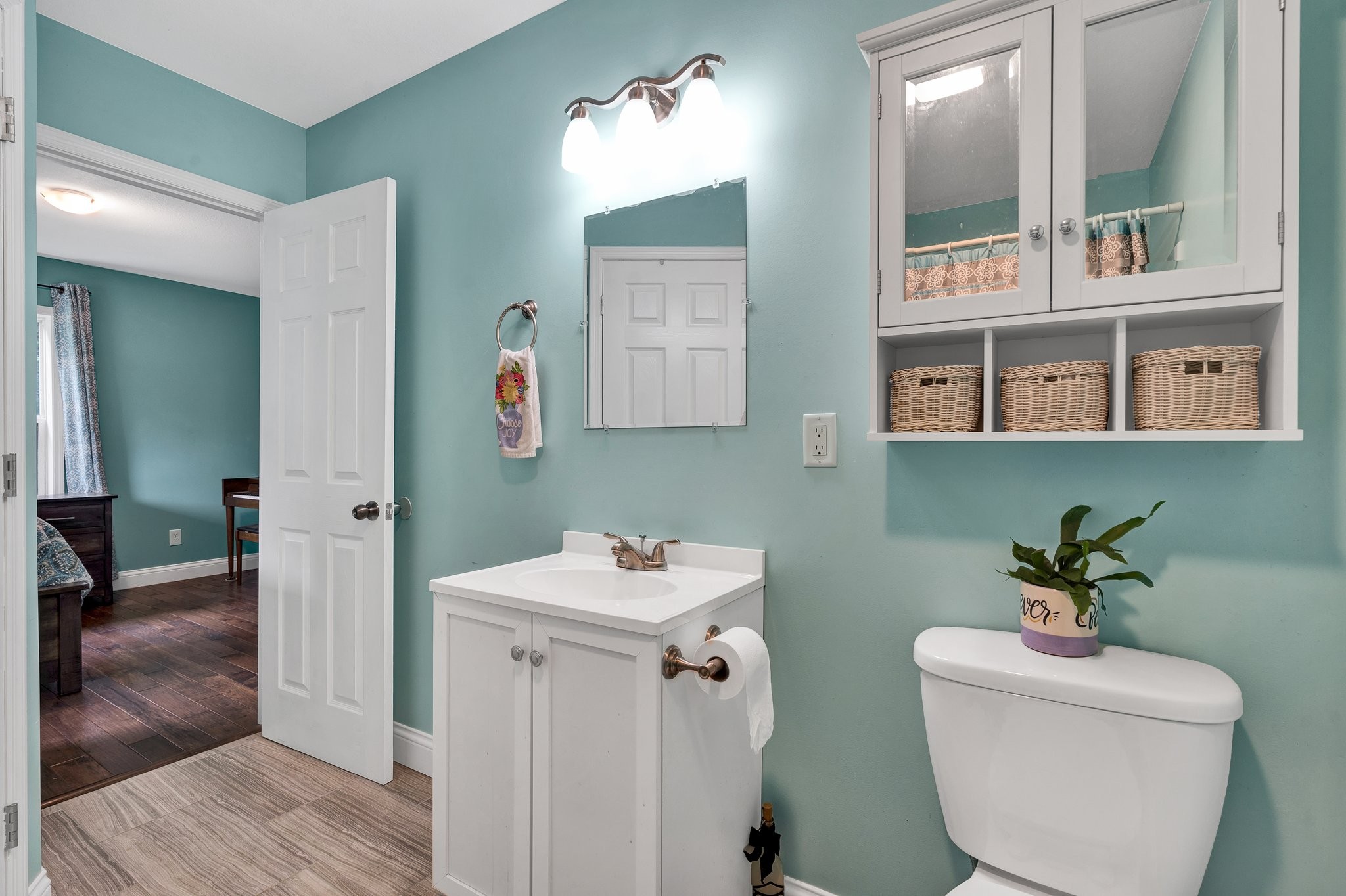 1600 Union Road Southeast Cleveland, TN 37323 - Photo 23 of 68 a bathroom with a toilet sink and mirror
