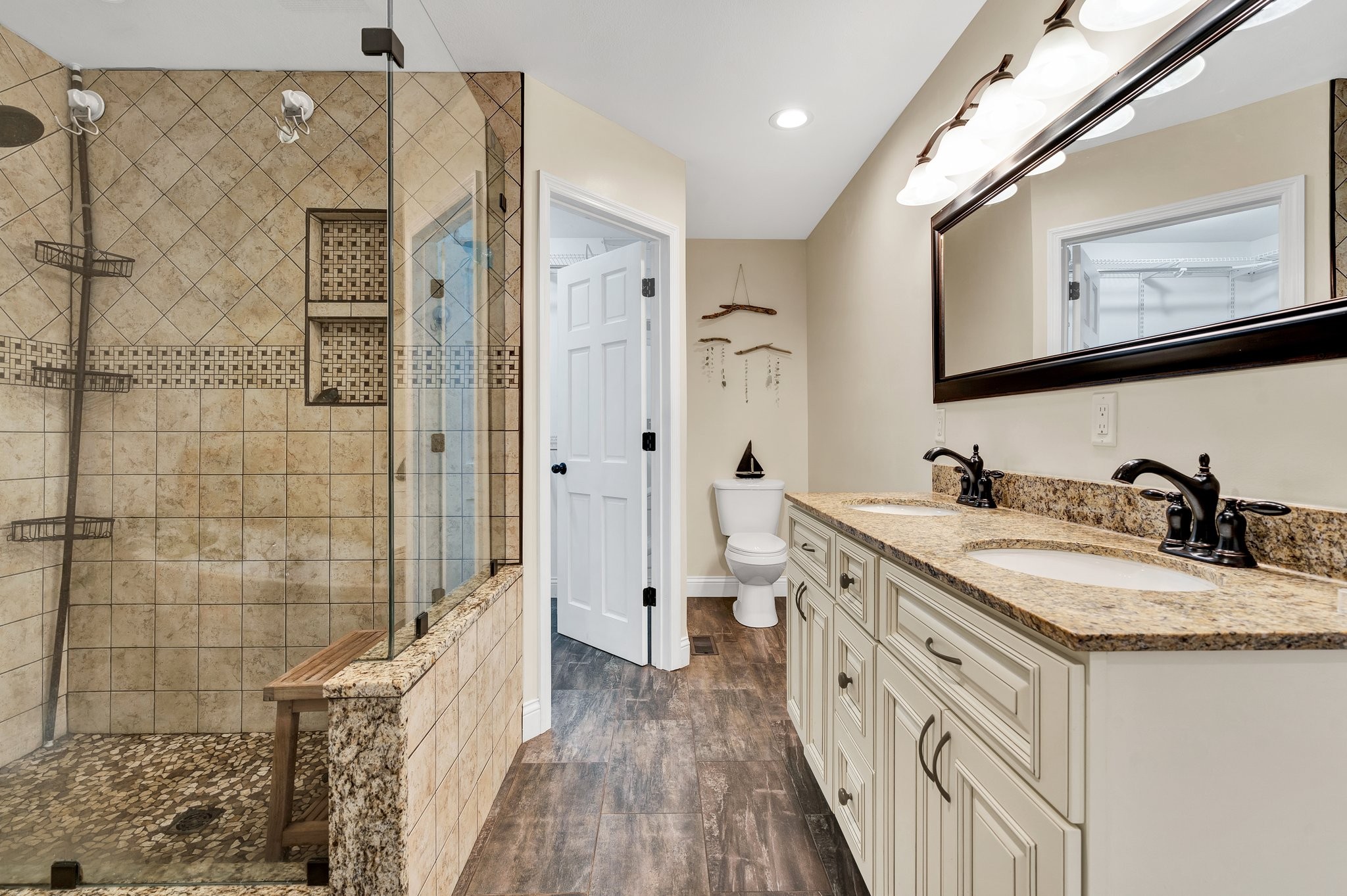 1600 Union Road Southeast Cleveland, TN 37323 - Photo 30 of 68 a spacious bathroom with a granite countertop double vanity sink a mirror and a shower